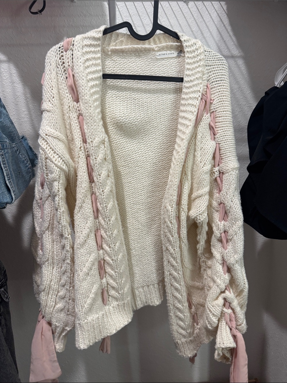 Altar'd State Cream Cable-Knit Cardigan with Pink Ribbon Accents